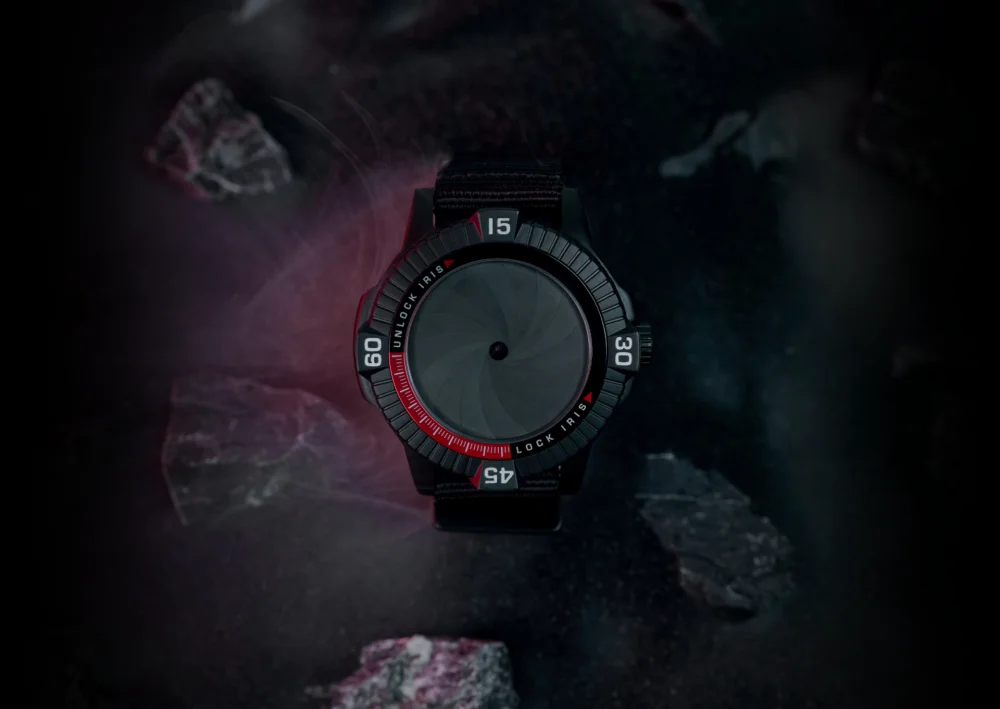 he new Traser P99 Iris Limited Edition watch with patented iris diaphragm offers a revolutionary combination of maximum readability and total dial concealment. background