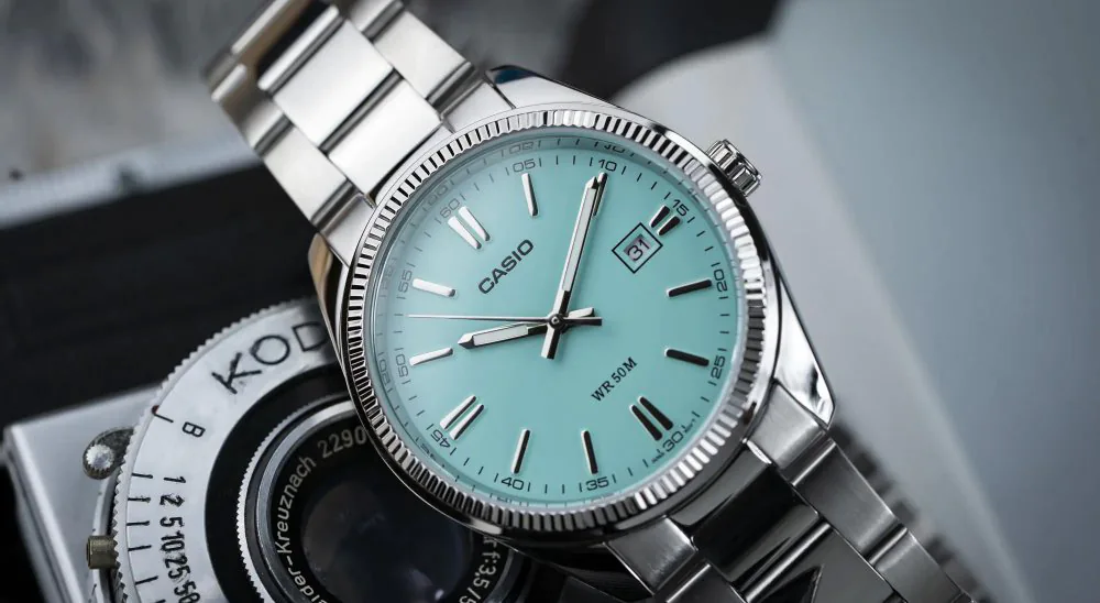 Watches Casio MTP-1302PD-2A2VEF „Tiffany Blue“ background